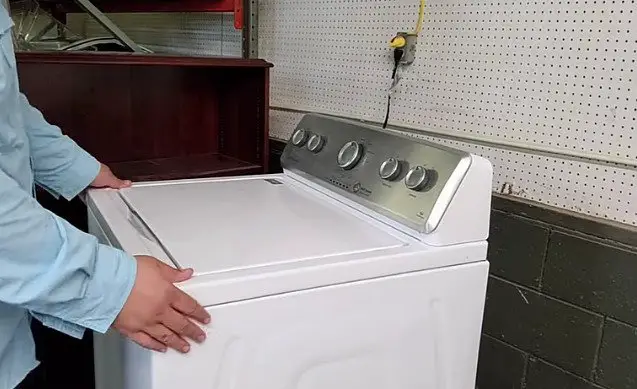 touching white lg washing machine