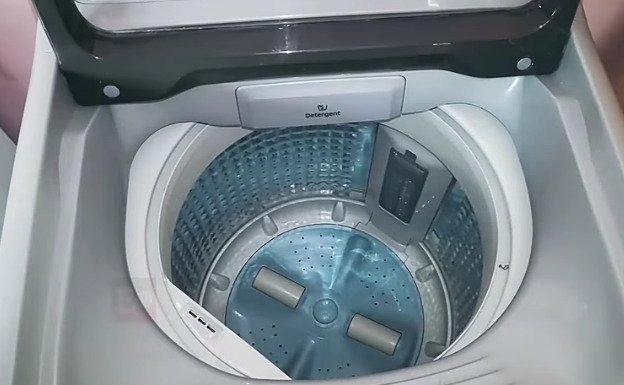 Top loader washing machine drain pipe height