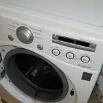 washing machine smoking and smells of rubber